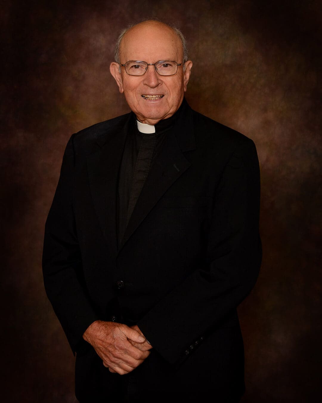 Father Conley Bertrand